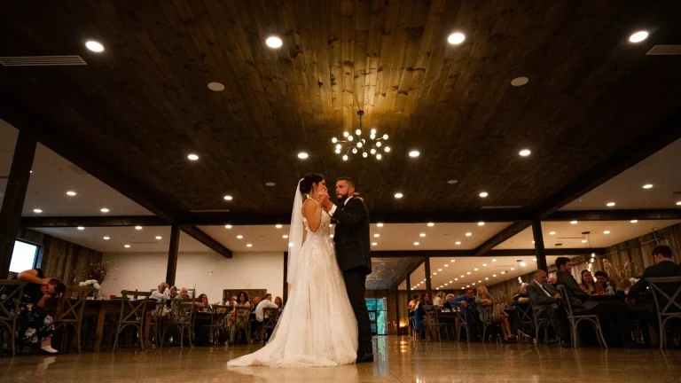 Emotional First Dance of Bride and Groom at Rustic Wedding